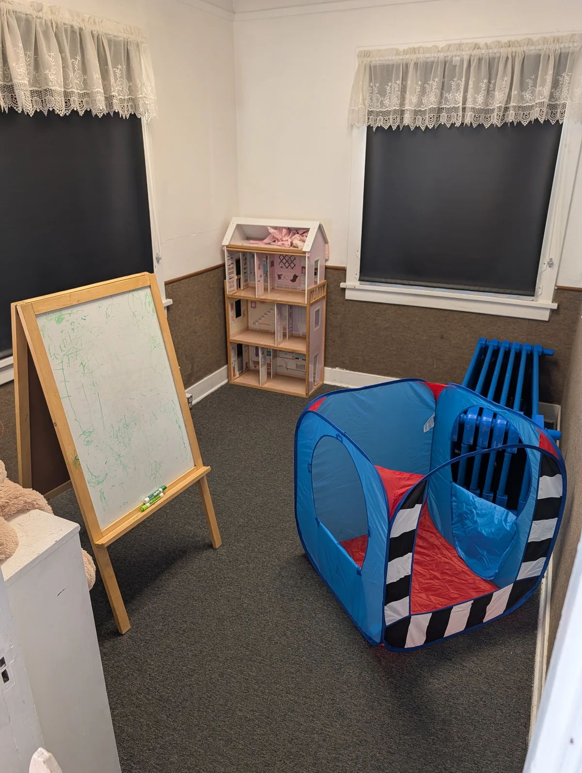 Creative art station with double-sided drawing easel, dollhouse and building toys